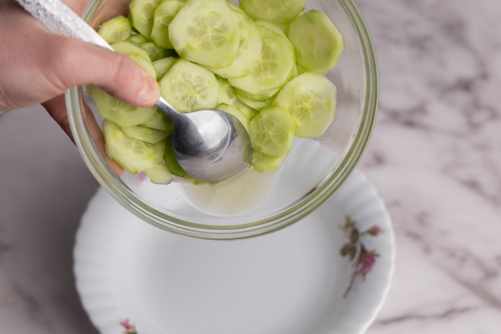 Draining cucumbers after sweating
